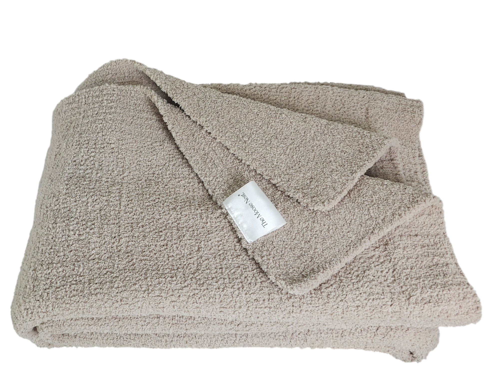 Fossil Greige Nest throw, showcasing its luxurious softness and sophisticated color palette,