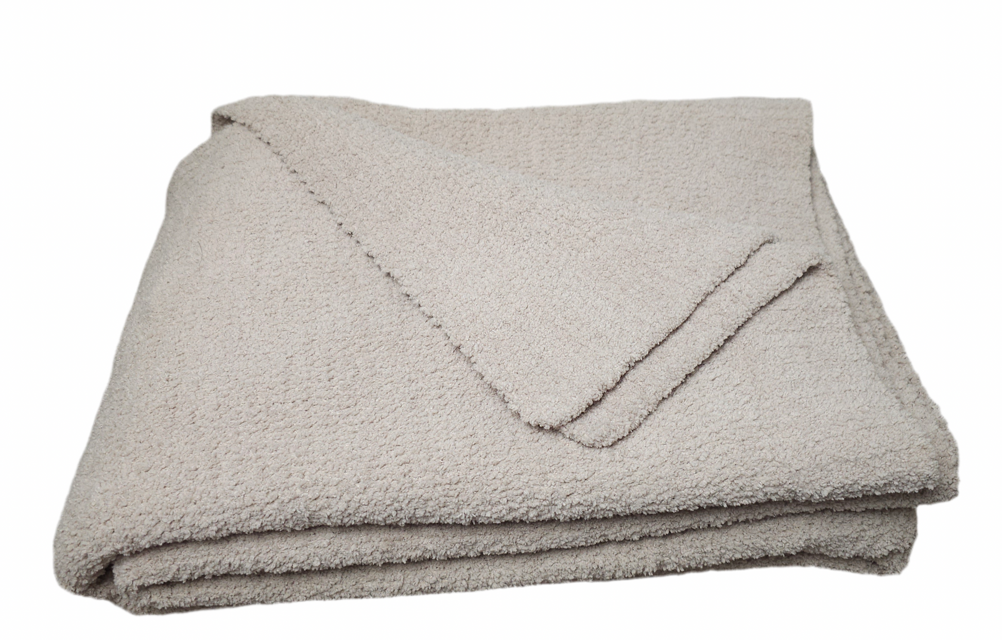 
Fossil Greige grey beige  Nest throw blanket hanging on driftwood, featuring its calming earthy hue and premium quality.