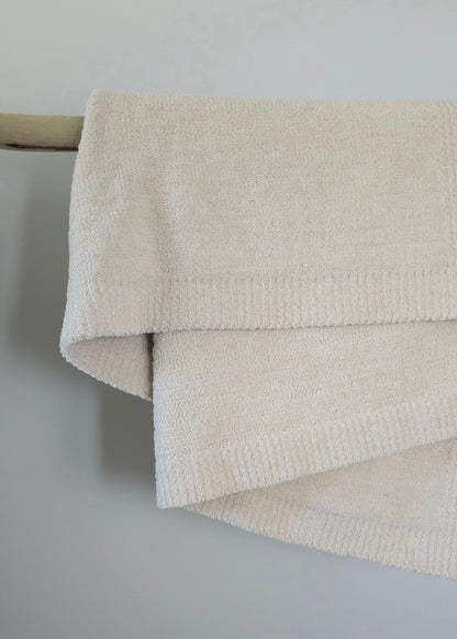 The Moose Nest Blanket The Sand Nest Throw Cozy Luxury Throw Blanket Washable bedding Durable Blanket Beach Travel Blanket Dog friendly home Easy care Coastal decor Minimalist home decor and bedding The Sand Nest Throw